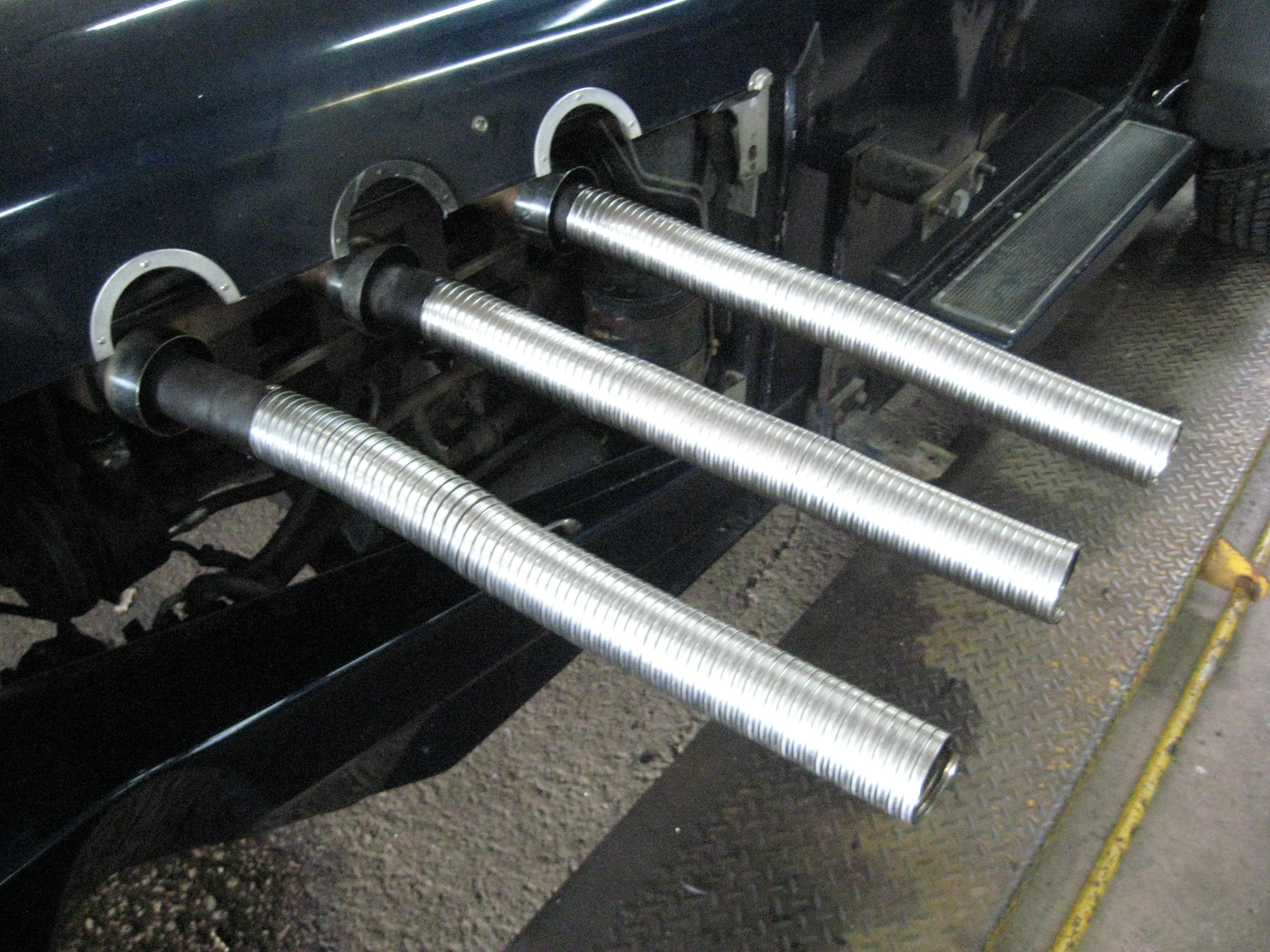 Automotive Exhaust Specialists work